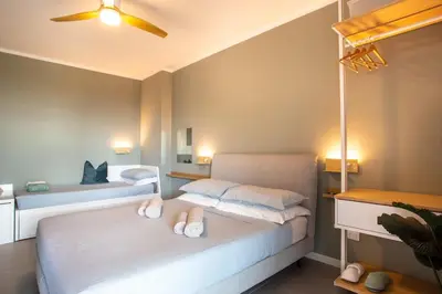 Letto o letti in una camera di Jesolo Vista Lido - Rooftop Suite
