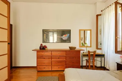 Letto o letti in una camera di Villa Montalban Ghetti - La Fiorita