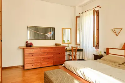 Letto o letti in una camera di Villa Montalban Ghetti - La Fiorita