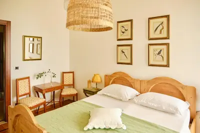 Letto o letti in una camera di Villa Montalban Ghetti - La Fiorita