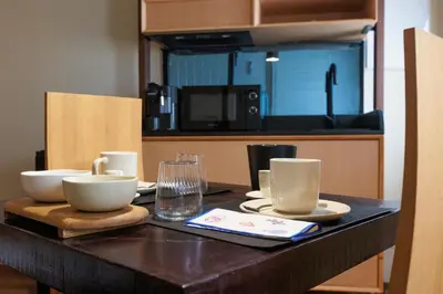 Cucina o angolo cottura di LE RIVE Guest House La Ciosà