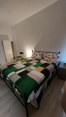 Letto o letti in una camera di Studio Milano
