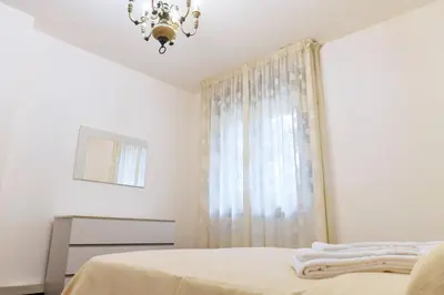 Letto o letti in una camera di Sole Abano Terme