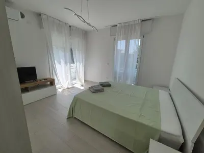 Letto o letti in una camera di La casa di Alessandro
