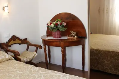 Letto o letti in una camera di Appartamento su 2 livelli ingresso indipendente