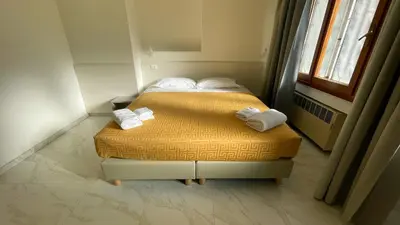 Letto o letti in una camera di M9 Rest House Venice