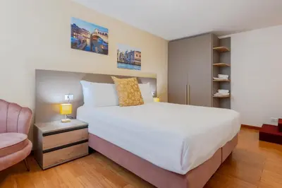 Letto o letti in una camera di Ca' Spadaria San Marco Family Apartment