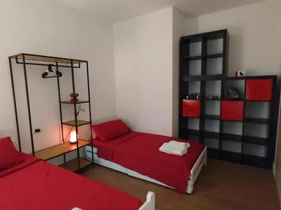 Letto o letti in una camera di Casa Domotica