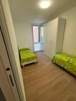Letto o letti in una camera di Oksy House Free Parking and Tram to Venice at 1 minute