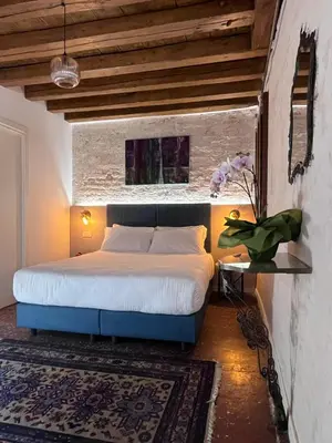 Letto o letti in una camera di Casanova Hideaway