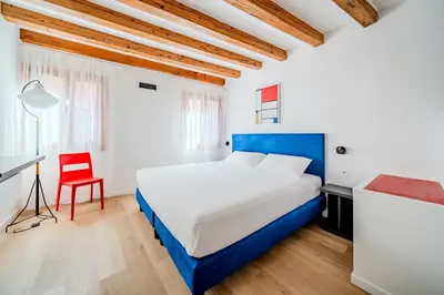 Letto o letti in una camera di Suite Mondrian e Suite Monet 100m dalla Biennale