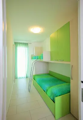 Letto o letti in una camera di Residence Antenore Vista Piscina