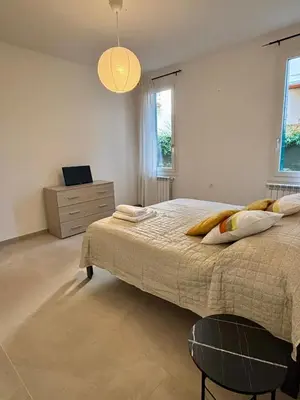Letto o letti in una camera di Villa Vittoria Apartments