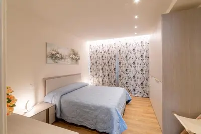 Letto o letti in una camera di EnJoy Home - Appartamento Terra, Il Canterale