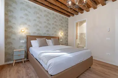 Letto o letti in una camera di Domus Apostoli Balcony