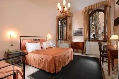 Letto o letti in una camera di La Locandiera