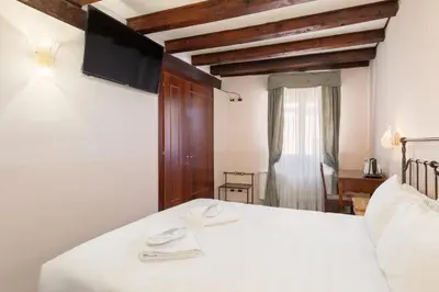 Letto o letti in una camera di La Locandiera