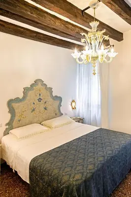Letto o letti in una camera di La petite Dogaressa