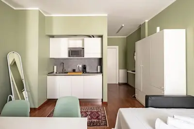 Cucina o angolo cottura di GuestHost - Porta Portello Cozy Apartment Padova