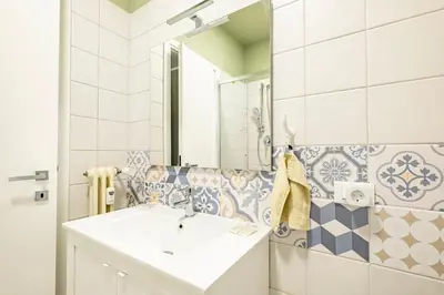 Bagno di GuestHost - Porta Portello Cozy Apartment Padova