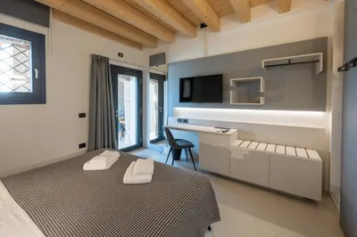 Letto o letti in una camera di Alma Room