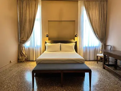 Letto o letti in una camera di Palazzo del '400