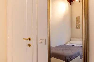 Letto o letti in una camera di San Vito Sweet Home