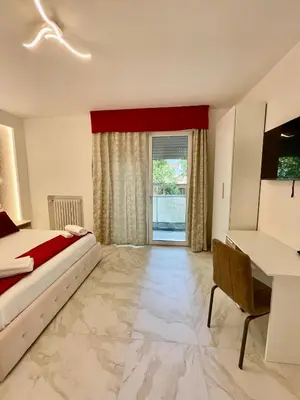 Letto o letti in una camera di SAFA VENiCE STATION