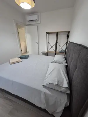 Letto o letti in una camera di Casa Cristina