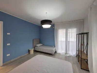 Letto o letti in una camera di Casa Anna