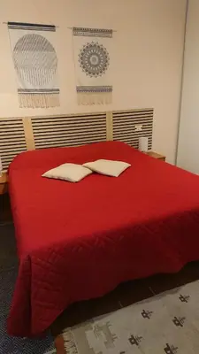 Letto o letti in una camera di Camere L'Alpino