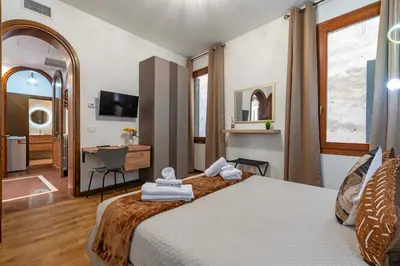 Letto o letti in una camera di Ca'Julia