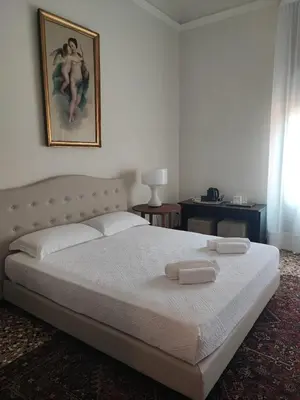 Letto o letti in una camera di Cà degli Stueri