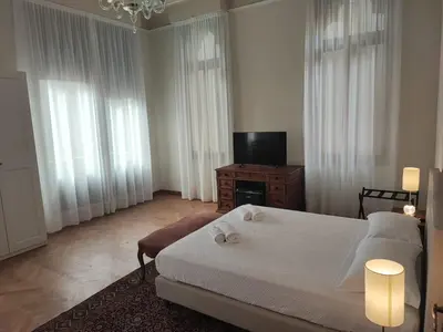 Letto o letti in una camera di Cà degli Stueri