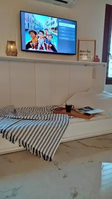 TV o dispositivi per l'intrattenimento presso Appartamento Dolce Far Niente