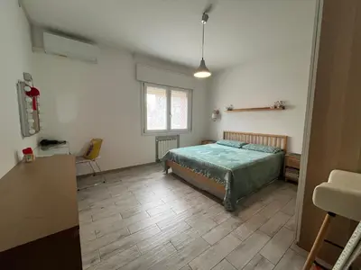 Letto o letti in una camera di 威尼斯民宿Venezia Stay 东北阿姨的小屋
