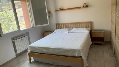 Letto o letti in una camera di 威尼斯民宿Venezia Stay 东北阿姨的小屋