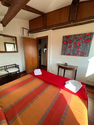 Letto o letti in una camera di Incantevole Loft a Venezia