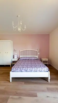 Letto o letti in una camera di La Dimora Di Roncajette Alloggi e Trattoria