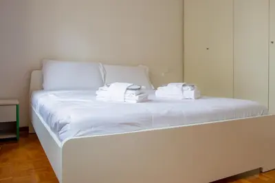 Letto o letti in una camera di Welc-ōM Crescini Padova