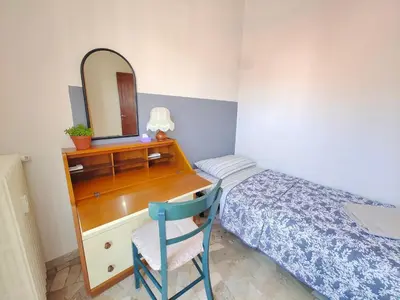 Letto o letti in una camera di Venezia Stella