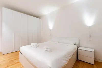 Letto o letti in una camera di Moderno appartamento in centro a Treviso - sotto i portici