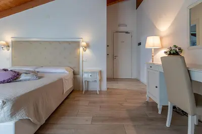Letto o letti in una camera di Agriturismo Casa Rossa