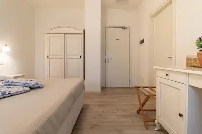 Letto o letti in una camera di Agriturismo Casa Rossa