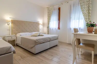 Letto o letti in una camera di Agriturismo Casa Rossa