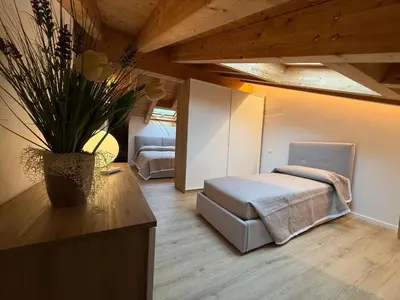 Letto o letti in una camera di Casa Alma