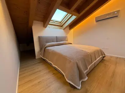 Letto o letti in una camera di Casa Alma