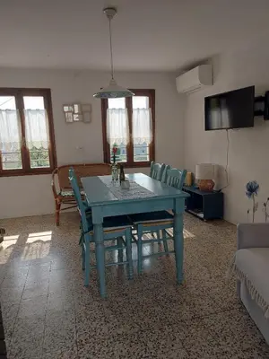 Area soggiorno di The garden holiday apartment