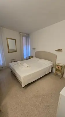 Letto o letti in una camera di Venice Heart Rooms