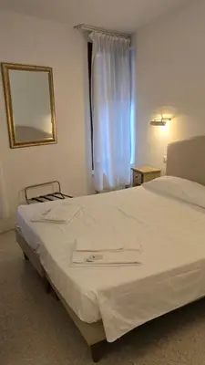 Letto o letti in una camera di Venice Heart Rooms